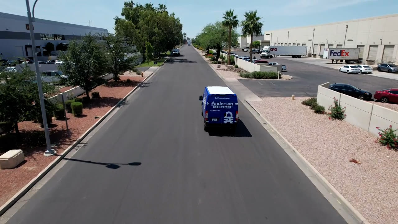 Anderson Lock & Safe service van in a Phoenix commercial district